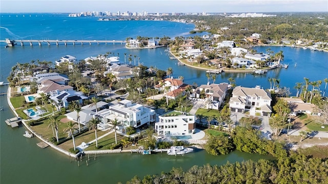 aerial view with a water view and a residential view