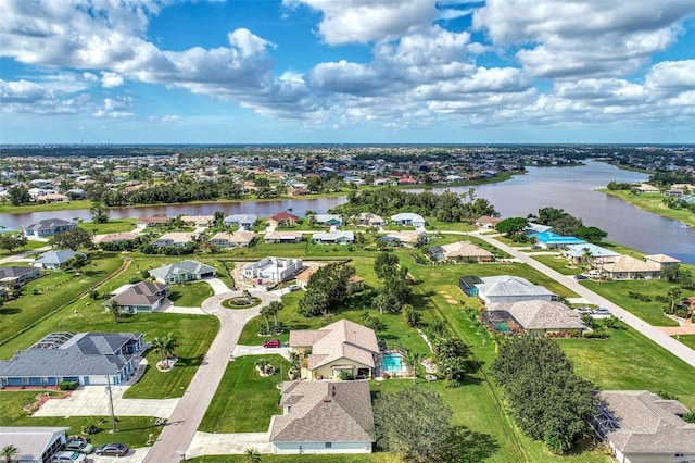 bird's eye view with a water view