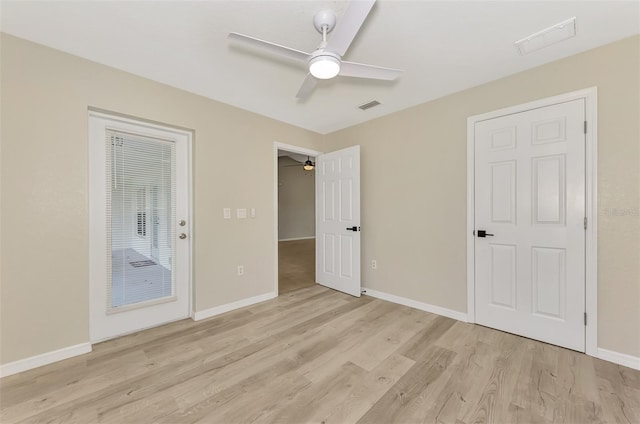 unfurnished bedroom with ceiling fan and light hardwood / wood-style flooring