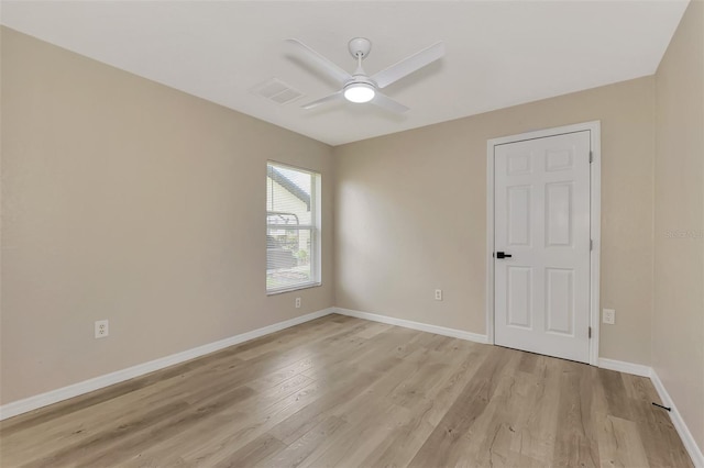 unfurnished room featuring ceiling fan and light hardwood / wood-style flooring