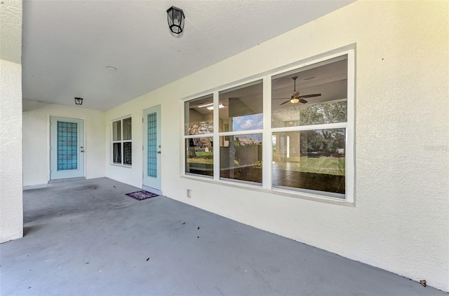 view of patio / terrace featuring ceiling fan