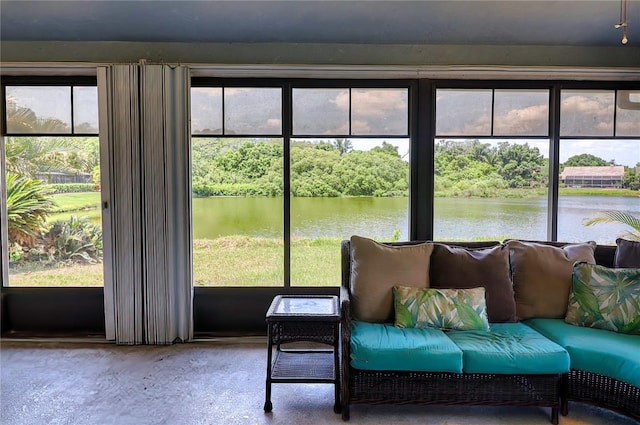 sunroom with a water view