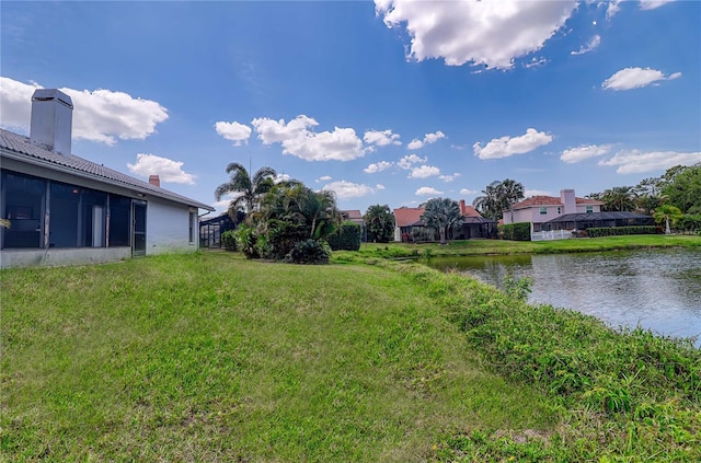 view of yard featuring a water view