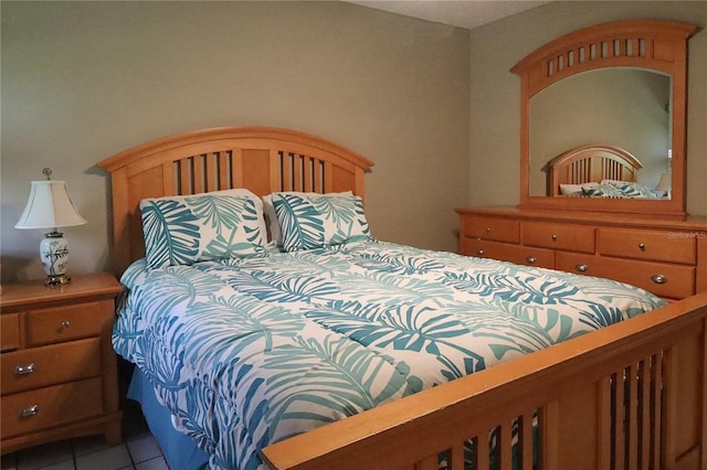 bedroom featuring light tile patterned floors