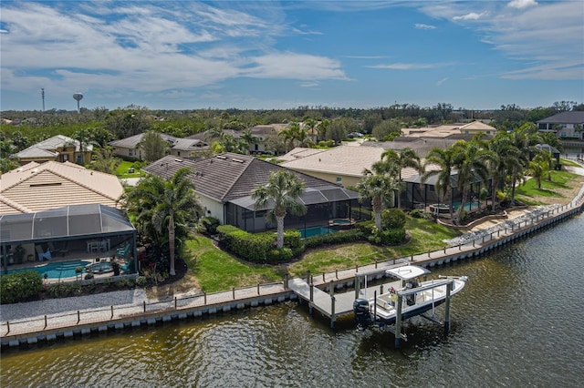 aerial view featuring a water view and a residential view