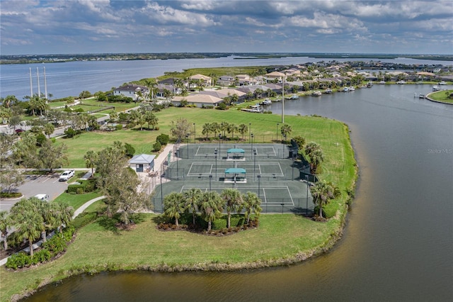 bird's eye view featuring a water view and a residential view