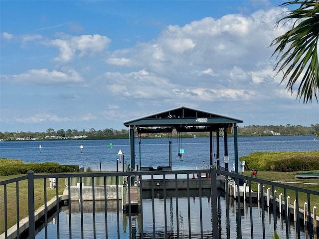 exterior space featuring a water view and boat lift