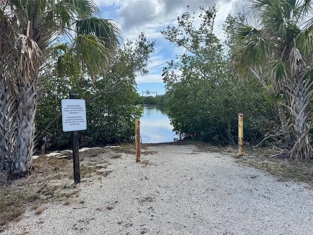 view of property's community featuring a water view