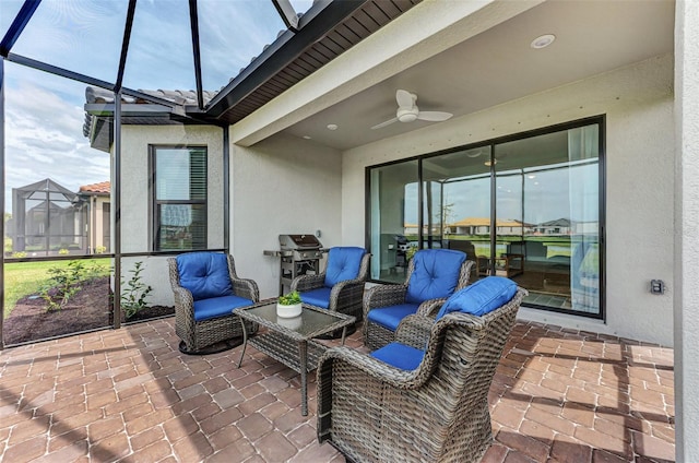 view of patio / terrace with ceiling fan and area for grilling