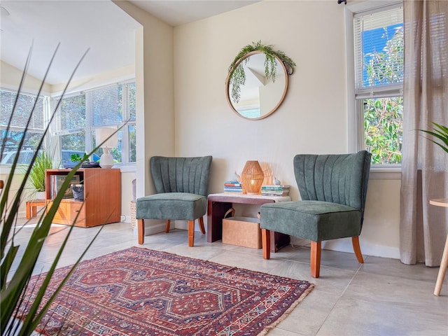 sitting room featuring a healthy amount of sunlight