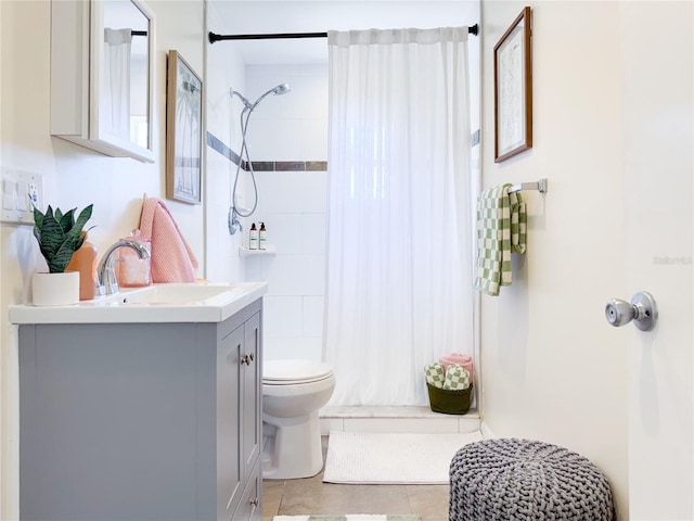 bathroom with vanity, a shower with curtain, and toilet