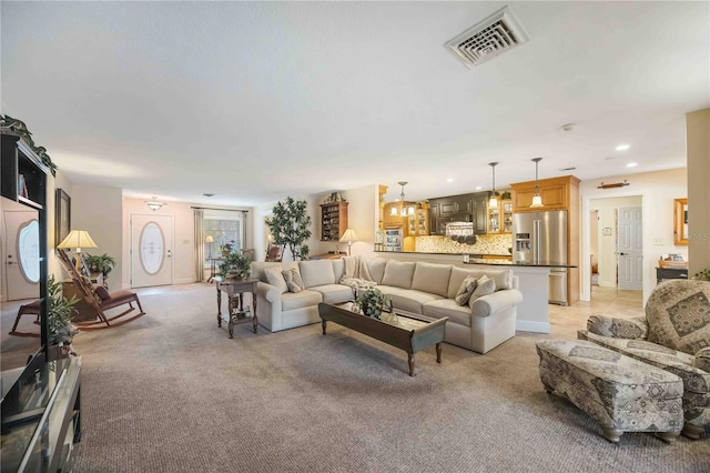 living room with light colored carpet