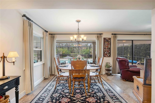 dining room featuring a chandelier