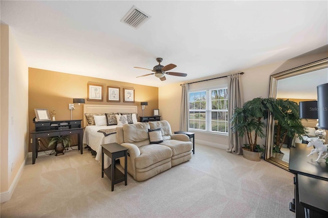 bedroom featuring ceiling fan and light colored carpet