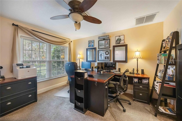 office featuring light colored carpet and ceiling fan