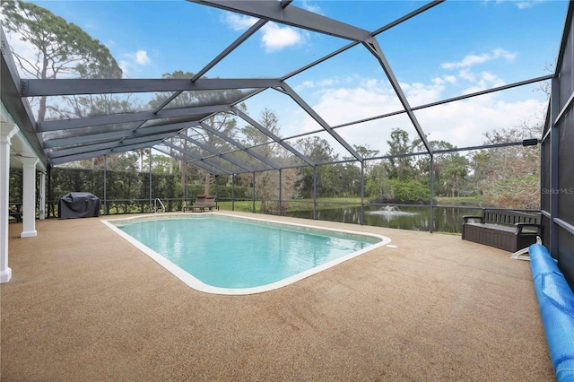 view of pool featuring a grill, a lanai, a patio, and a water view