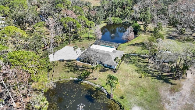 birds eye view of property with a water view