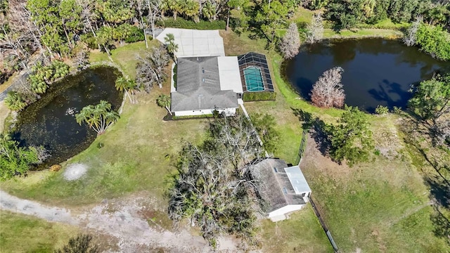 drone / aerial view with a water view