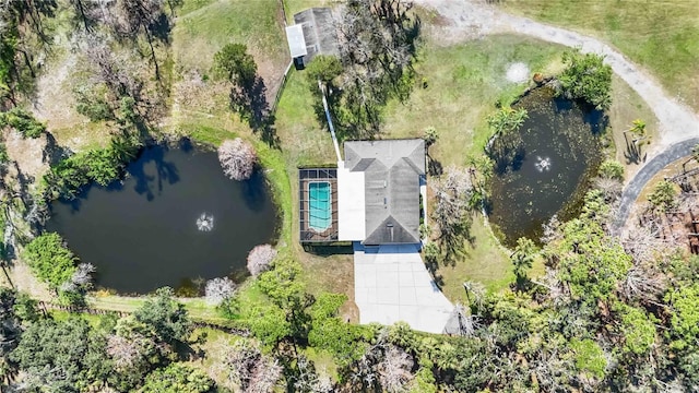 drone / aerial view with a water view