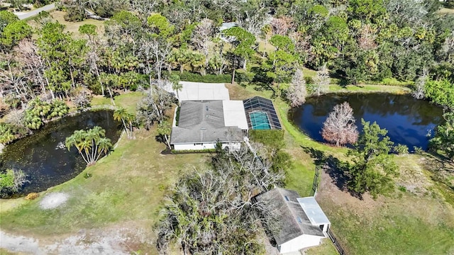 drone / aerial view with a water view