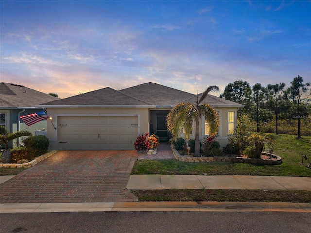 single story home with a garage