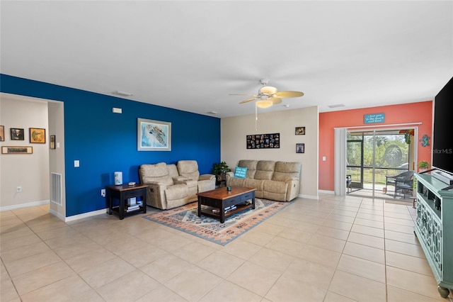 tiled living room featuring ceiling fan