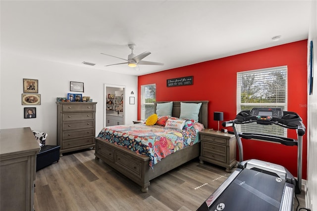 bedroom featuring ceiling fan and dark hardwood / wood-style flooring