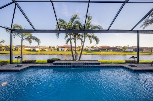 pool featuring a water view, a lanai, and a residential view