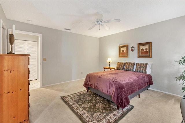 carpeted bedroom featuring ceiling fan