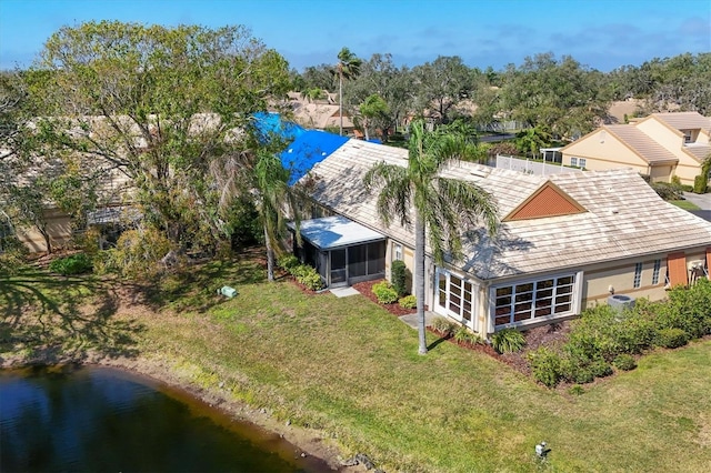 bird's eye view with a water view