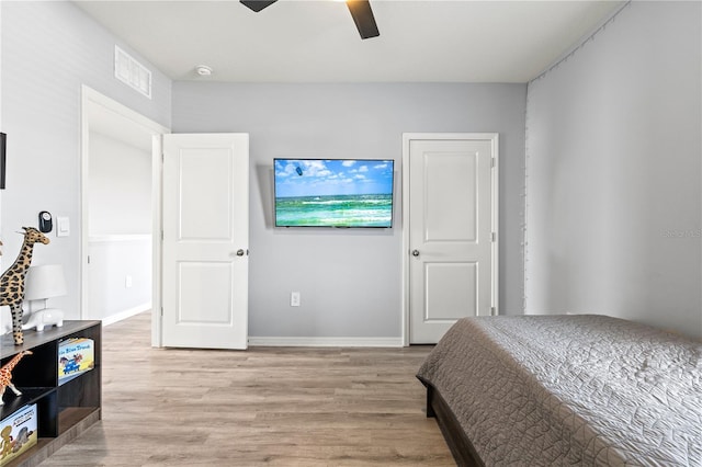 bedroom featuring ceiling fan and light wood-type flooring