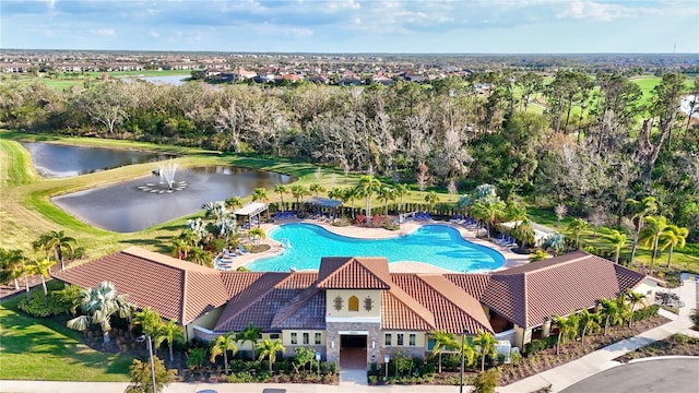 drone / aerial view with a water view