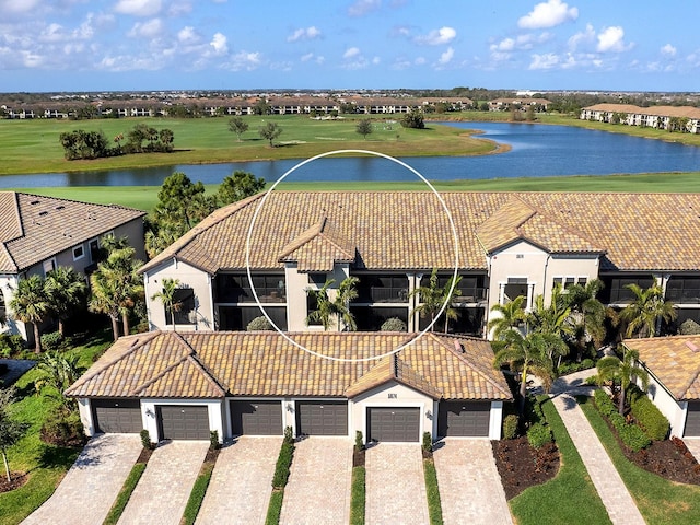 drone / aerial view featuring a water view