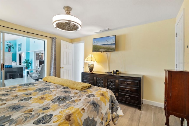 bedroom featuring light hardwood / wood-style floors