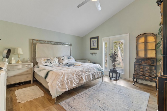 bedroom featuring ceiling fan, access to outside, high vaulted ceiling, and wood-type flooring