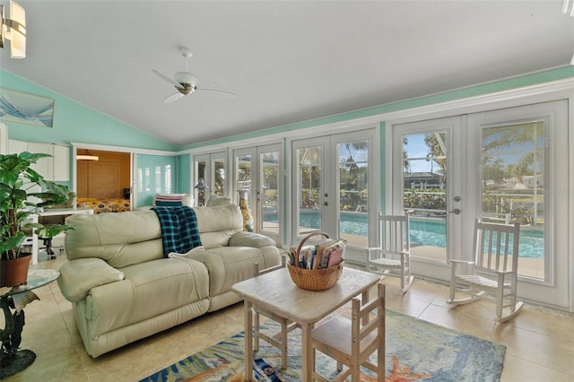 sunroom with vaulted ceiling, french doors, and ceiling fan