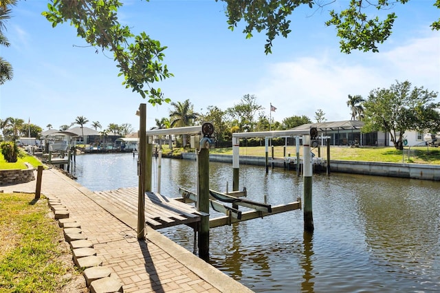 dock area with a water view