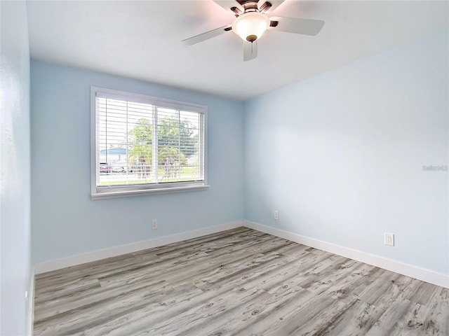 unfurnished room with light hardwood / wood-style floors and ceiling fan