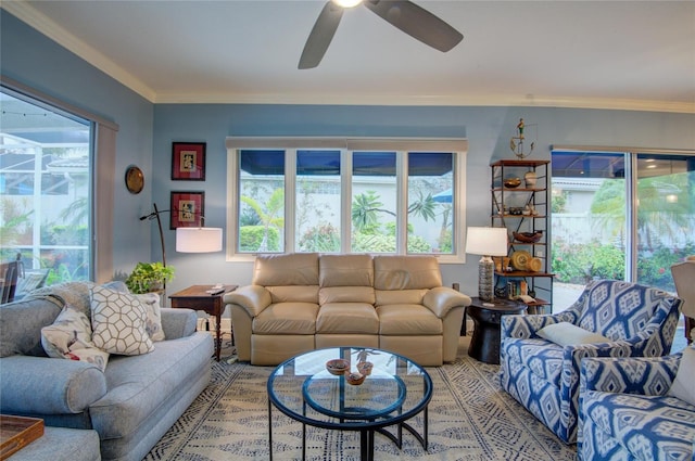 living room with crown molding and ceiling fan