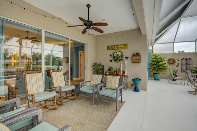 sunroom / solarium with ceiling fan