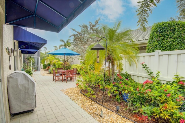 view of patio / terrace with a grill