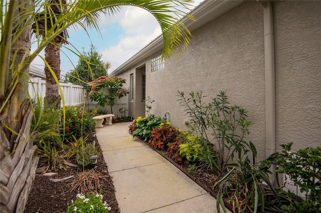 view of side of home featuring a patio