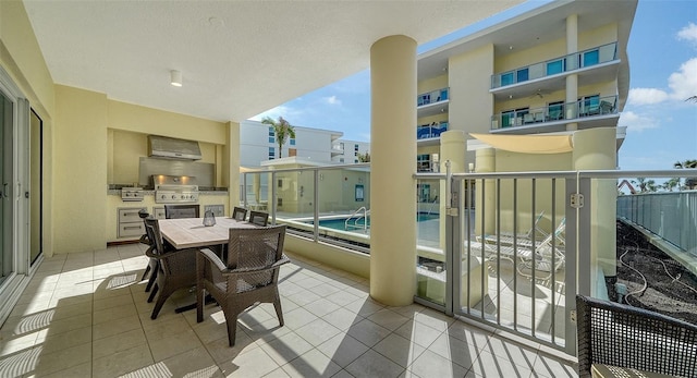 balcony with area for grilling and grilling area