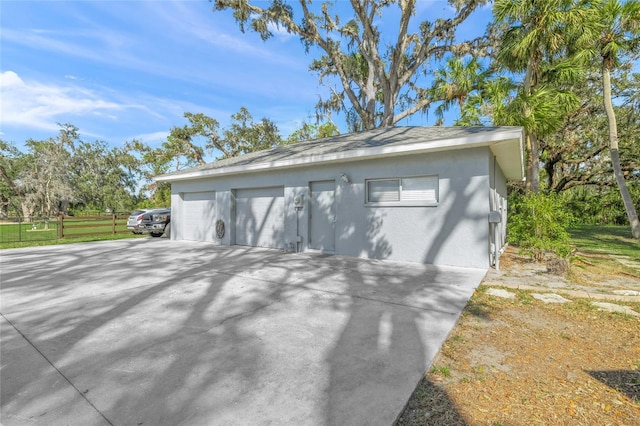 detached garage with fence