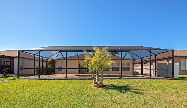 view of yard with a lanai and a patio area