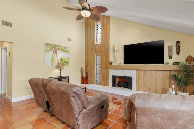 living room featuring tile patterned flooring, high vaulted ceiling, and ceiling fan