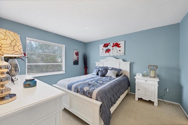 carpeted bedroom with a textured ceiling