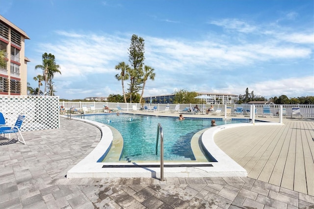 view of swimming pool with a patio area