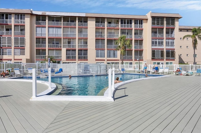 view of swimming pool featuring a patio area