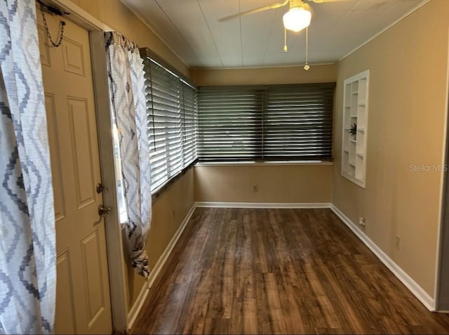 spare room featuring dark hardwood / wood-style floors